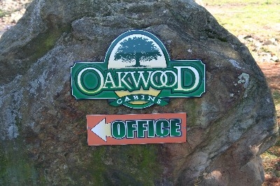 Sign to office - You are on Oakwood Cabins property.